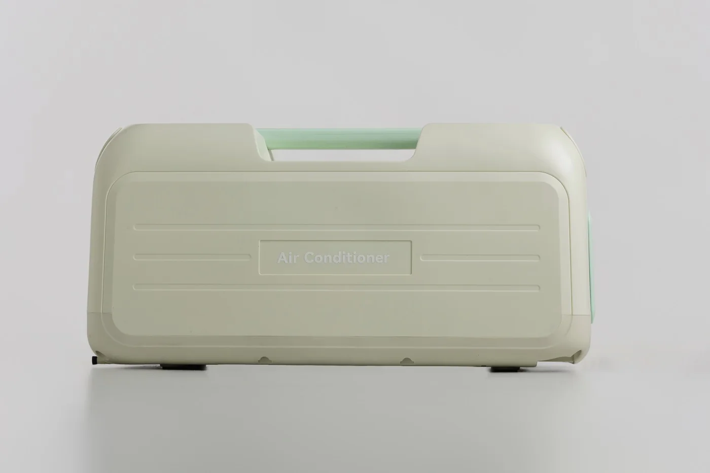 Side profile of the unit, showing its depth and the embossed lettering